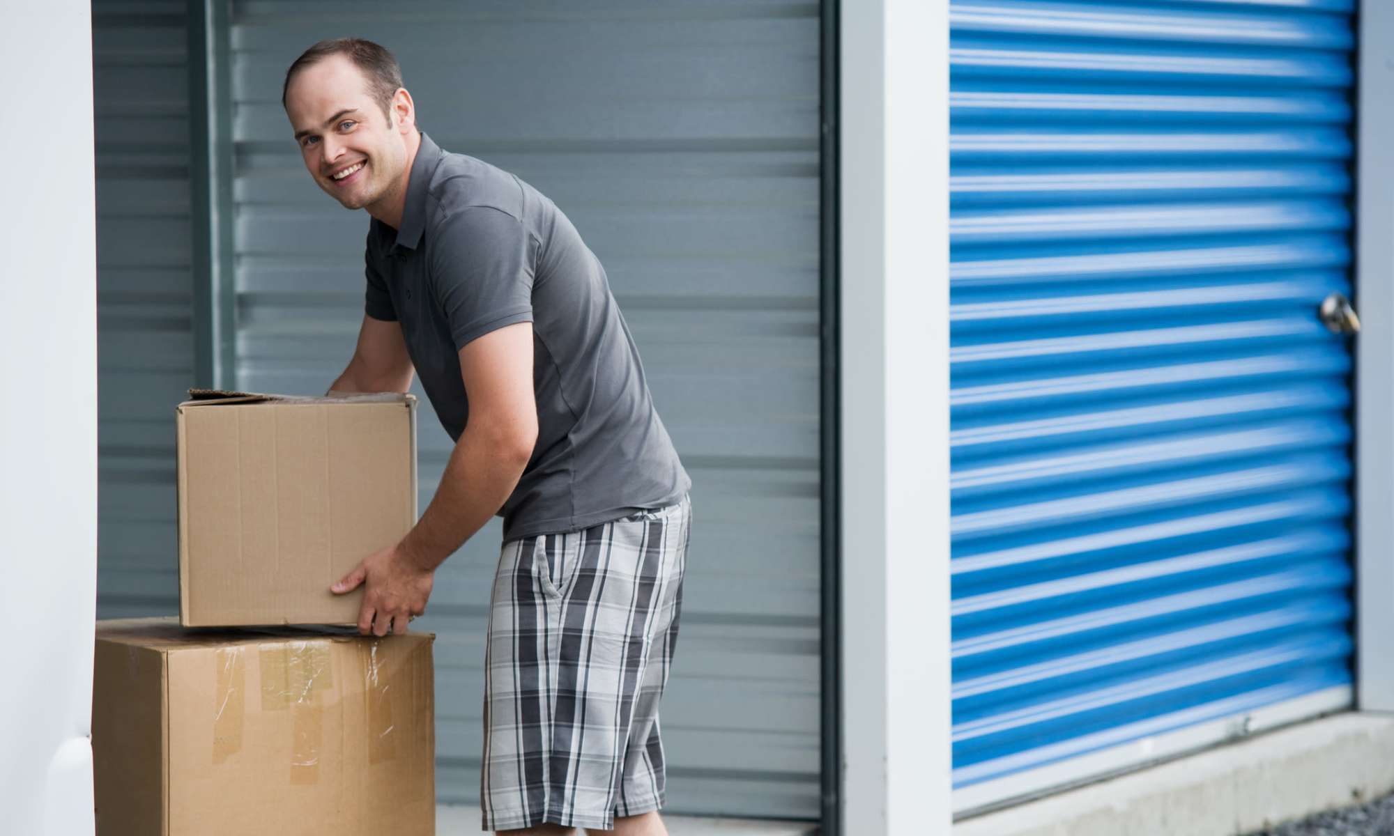 Customer loading his boxes into one of our large storage units at Citizen Storage in Stevens, Pennsylvania