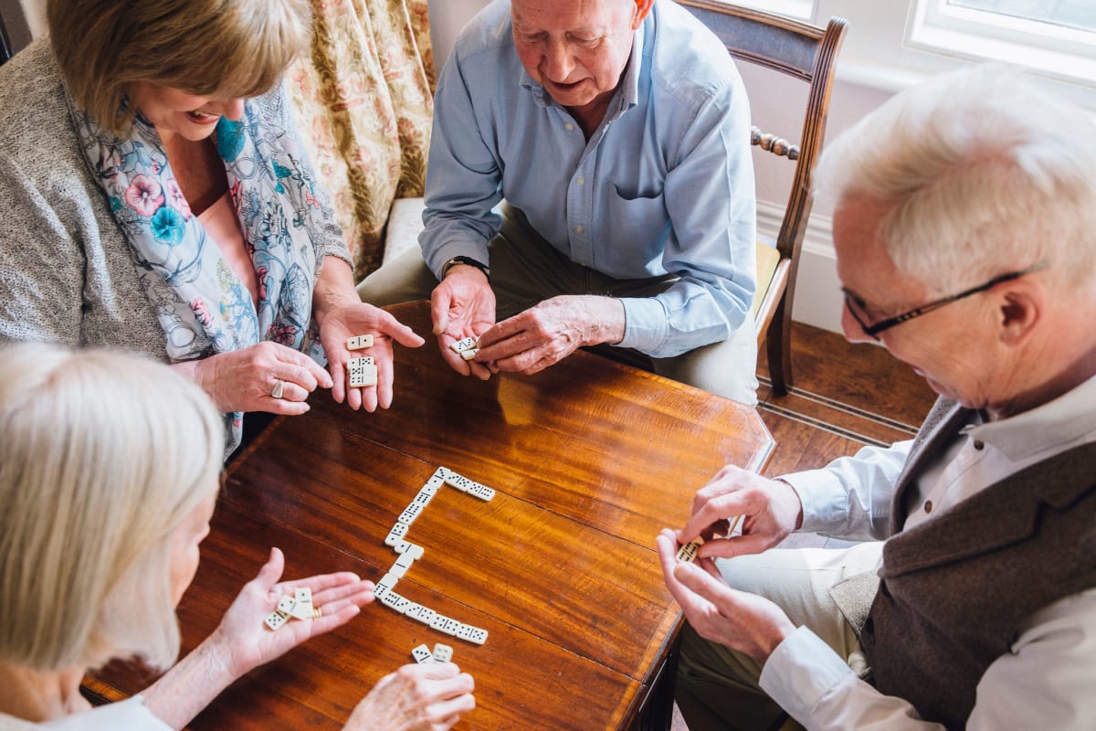 Residents playing a game together at The Oxford Grand Assisted Living & Memory Care in Kansas City, Missouri