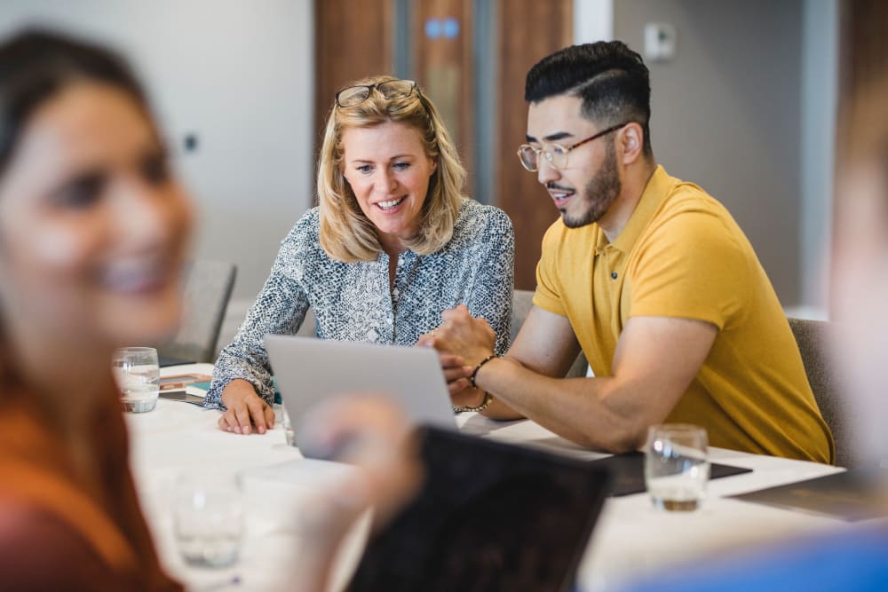 Coworkers collaborating at Morgan Properties in Conshohocken, Pennsylvania