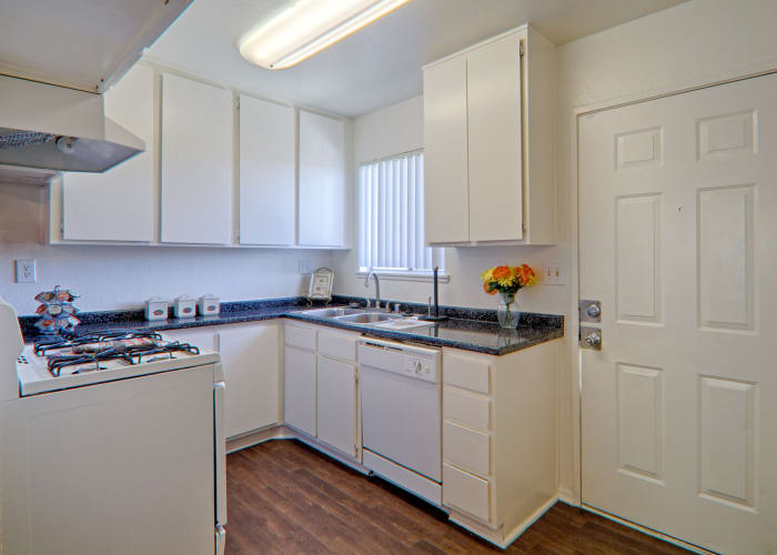 Open kitchen at Woodlands West Apartment Homes in Lancaster, CA