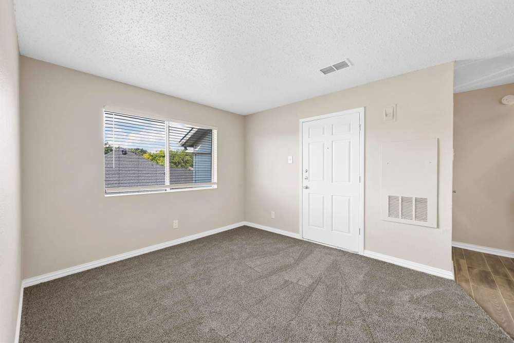 Empty as spacious living room at Village Square in Irving 