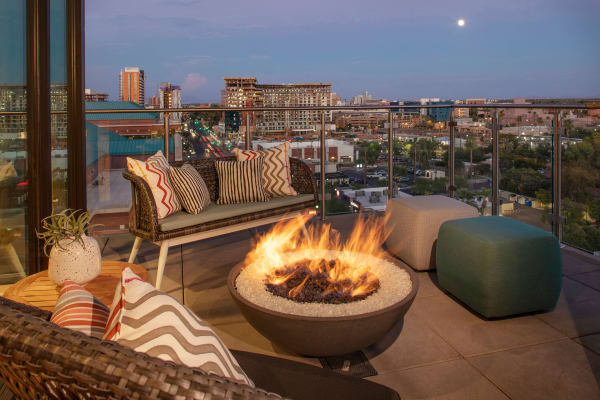 Balcony with fire place at The Local Apartments in Tempe, Arizona