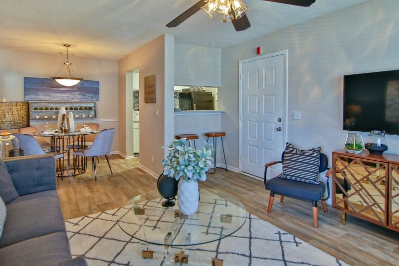 Open concept living room with view of breakfast nook at Lyric on Bell in Antioch, Tennessee