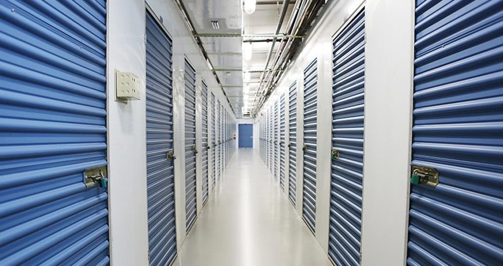 Storage units with yellow doors at Midgard Self Storage in Roswell, Georgia