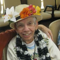 Happy senior woman enjoying activities at Eastern Star Masonic Retirement Campus in Denver, CO