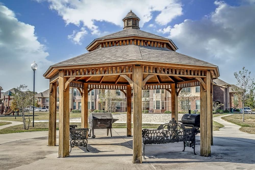 Gazebo with a grill and smoker at Chateau Mirage Apartment Homes in Lafayette, Louisiana