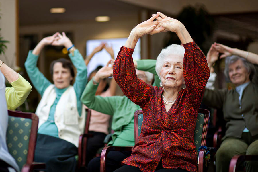 Residents stretching at Palo Alto Commons in Palo Alto, California