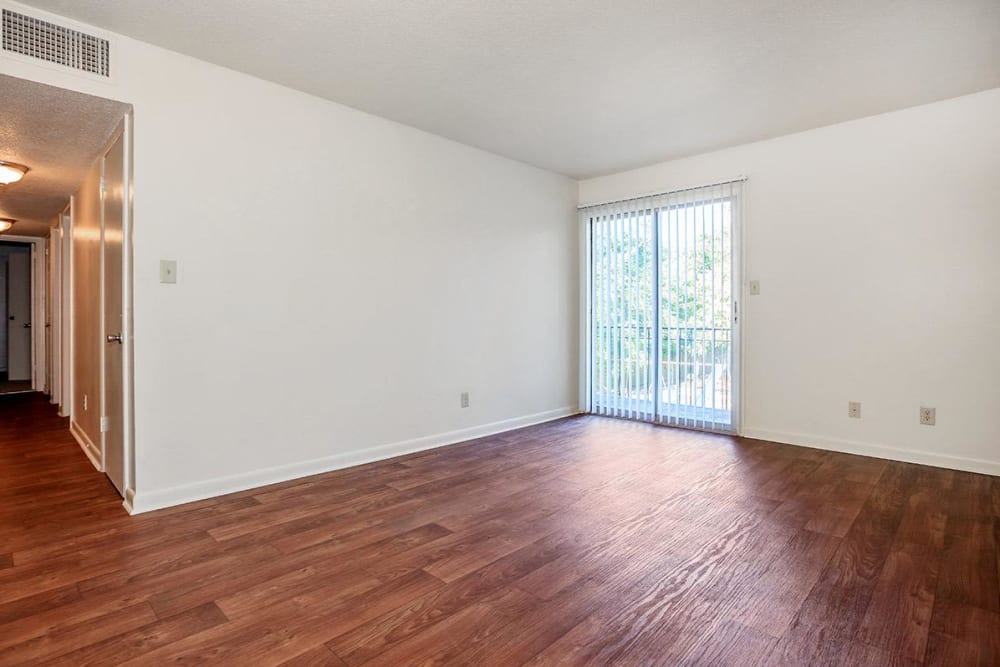 View of hallway featuring wood style flooring at Patrician Terrace Apartment Homes in Jackson, Tennessee