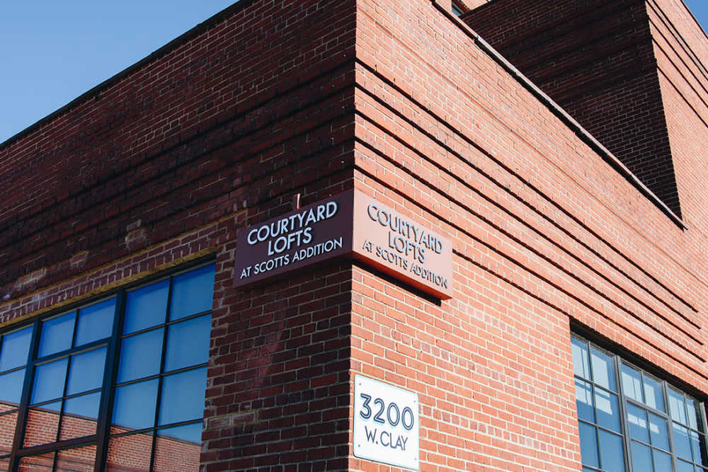 Brick exterior of Courtyard Lofts building at Courtyard Lofts at Scott’s Addition in Richmond, Virginia