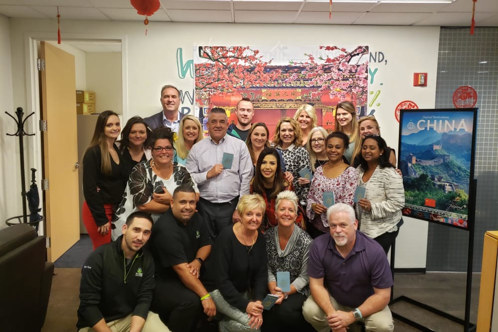 Group picture of the Inspired Destinations staff at Inspired Living in Ocoee, Florida.