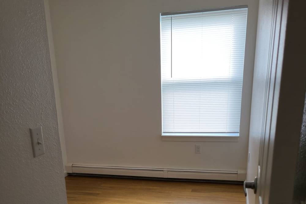 Unfurnished bedroom with window at Manistique Lakeview in Manistique, Michigan