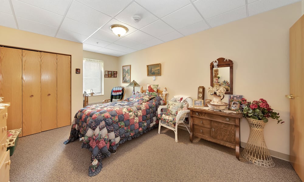 Bedroom in apartment at Bell Tower Residence Assisted Living in Merrill, Wisconsin