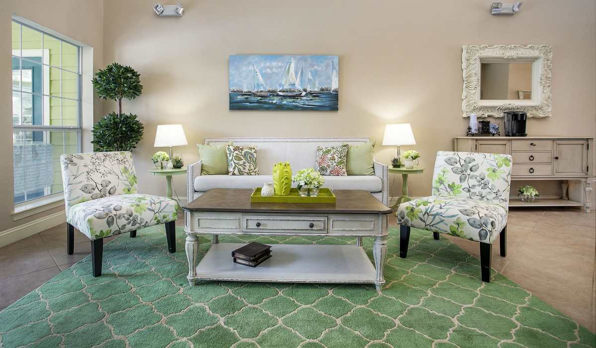Modern vibrant living room with green cushions at Summerwood in Tyler, Texas