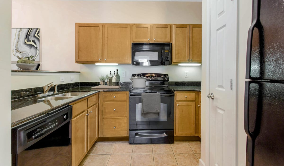 Kitchen with granite countertops at Ashley Court Apartments, Charlotte, North Carolina