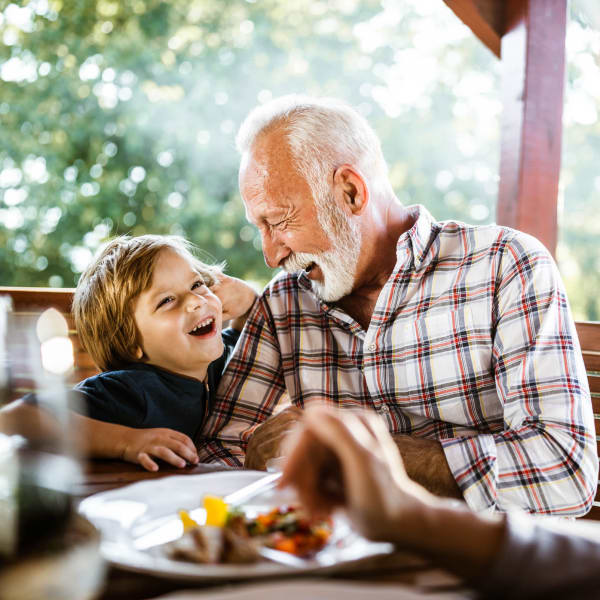 Family eating together at The Crest at Citrus Heights in Citrus Heights, California