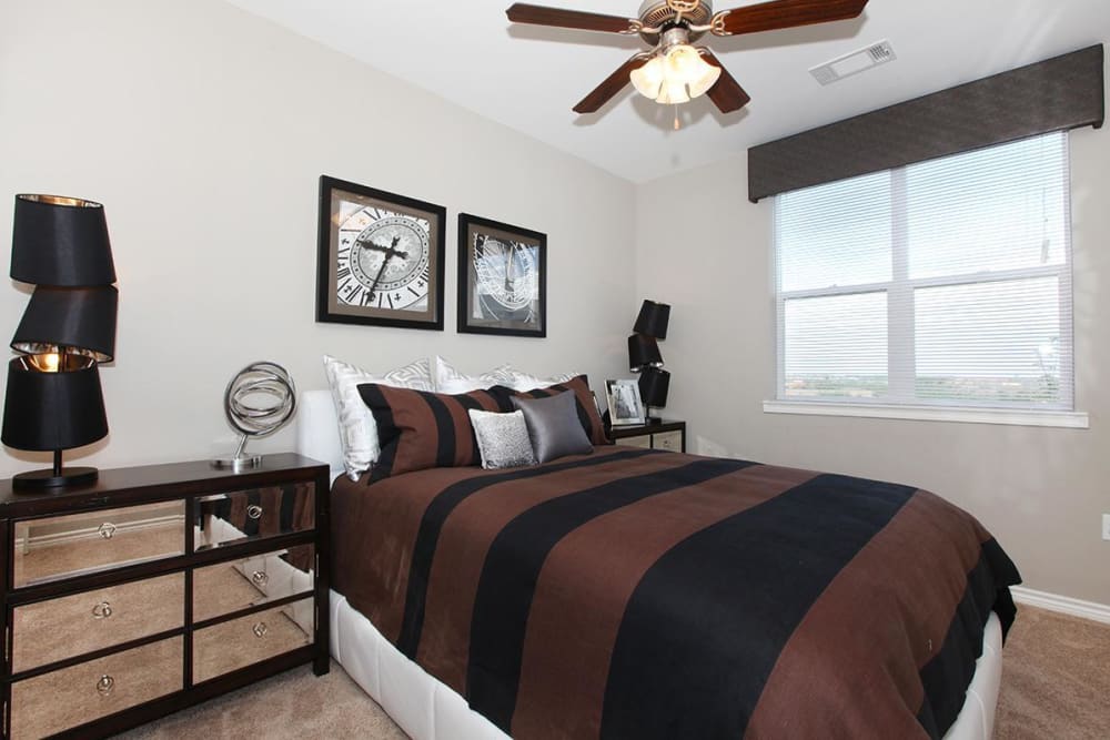 Spacious bedroom with ceiling fan at Outlook Ridge in Pueblo, Colorado