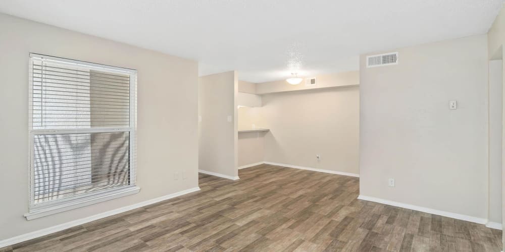 Spacious apartment with wood-style flooring at Tides on Avril in Fort Worth, Texas