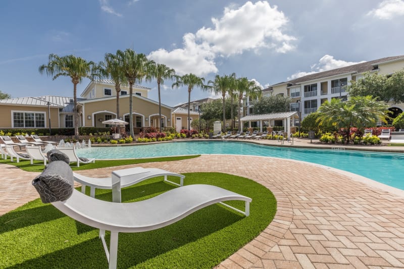 Lounge chairs poolside at Luxe at 1820 in Tampa, Florida