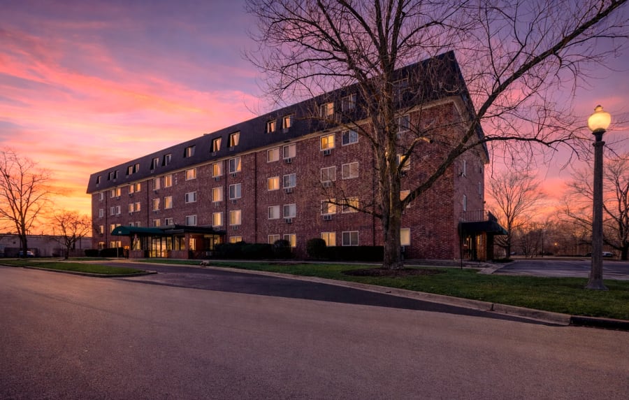 Exterior sunset at Bartlett Court Apartments in Streamwood, Illinois