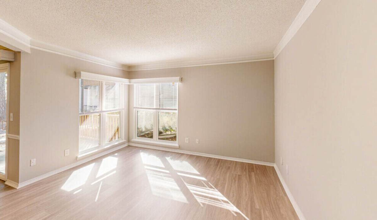 Spacious living room with large windows at Crickentree in Mt Pleasant, South Carolina