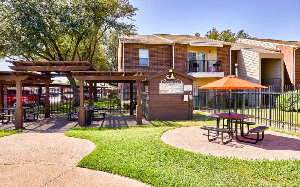 Outdoor entertainment deck at Creekwood Place in Lancaster, Texas