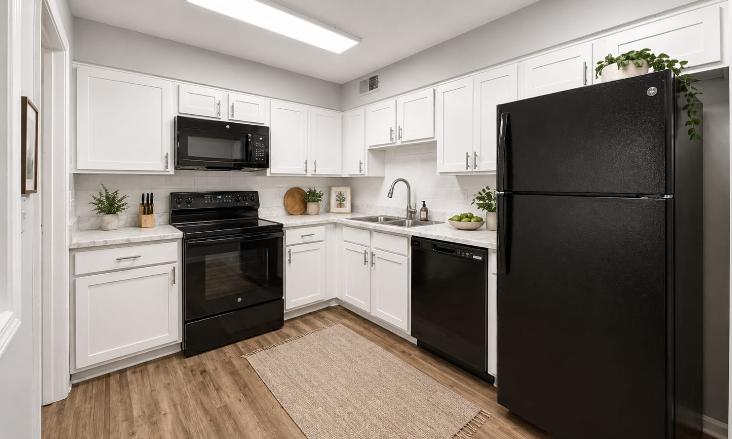 Well-lit kitchen at Georgetown Apartments in Merriam, Kansas