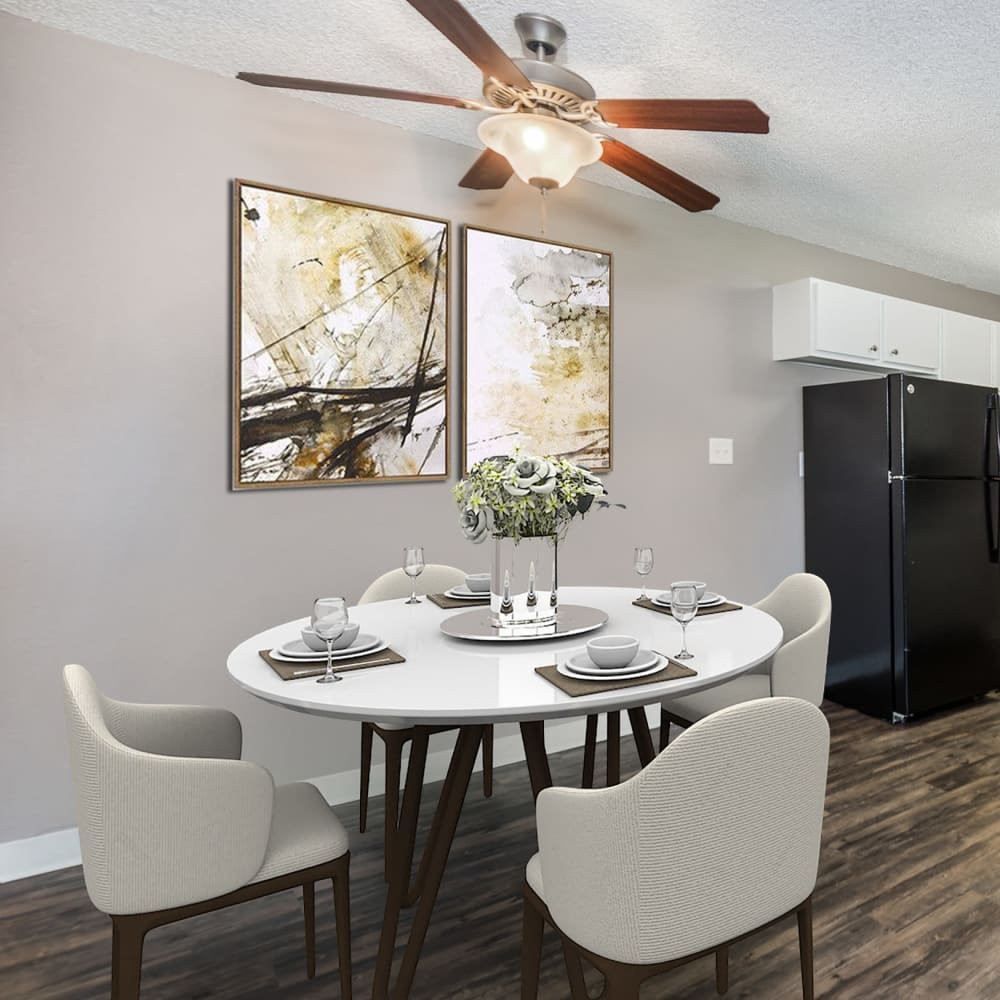 Dining table by kitchen at Florida Station Apartments in Aurora, Colorado