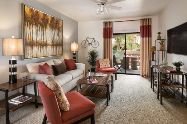 Model living room with unique accent lighting at San Prado in Glendale, Arizona