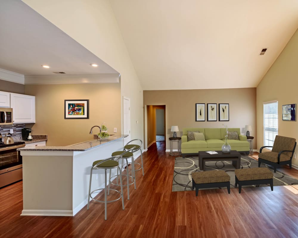 Kitchen and living room in a home at Christopher Wren Apartments & Townhomes in Wexford, Pennsylvania