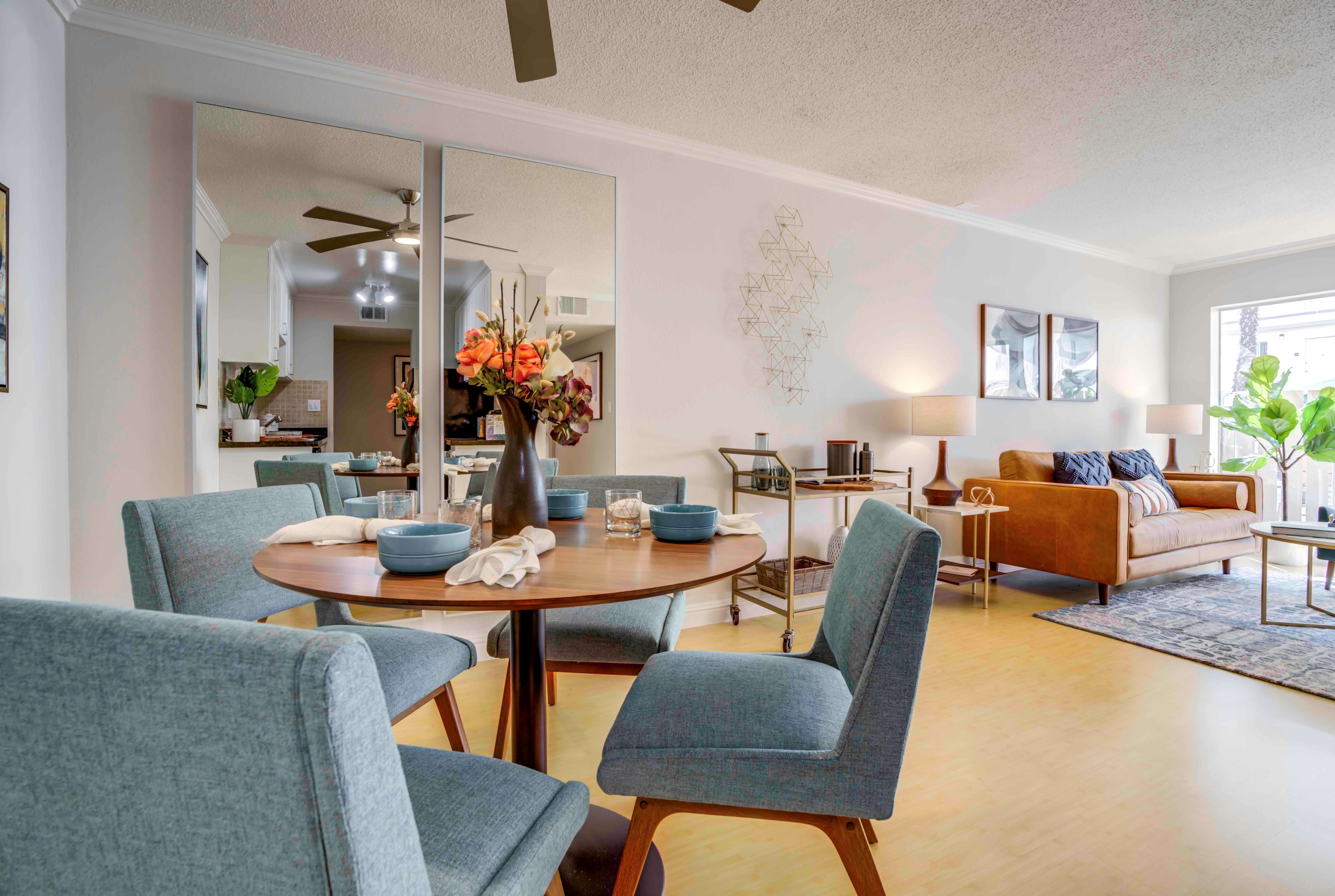 Well-furnished living area in the open-concept floor plan of a model home at Sofi Redwood Park in Redwood City, California