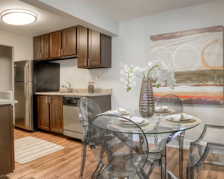Kitchen and dining room at Newport Crossing Apartments in Newcastle,