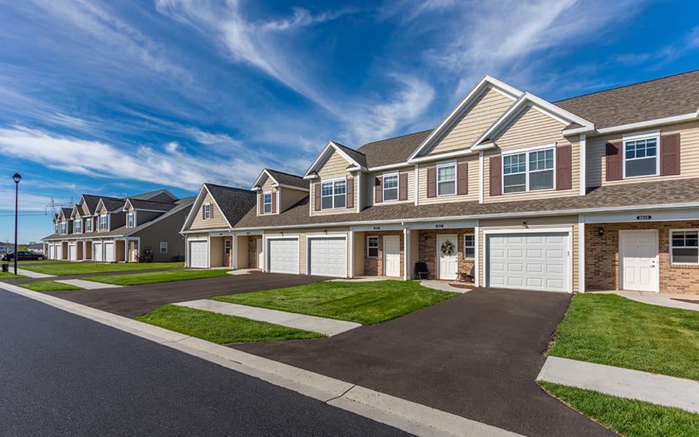 Street view of Woodland Acres Townhomes in Liverpool, New York