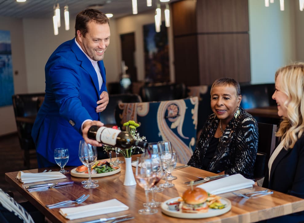 Residents at restaurant at Murano in Seattle, Washington