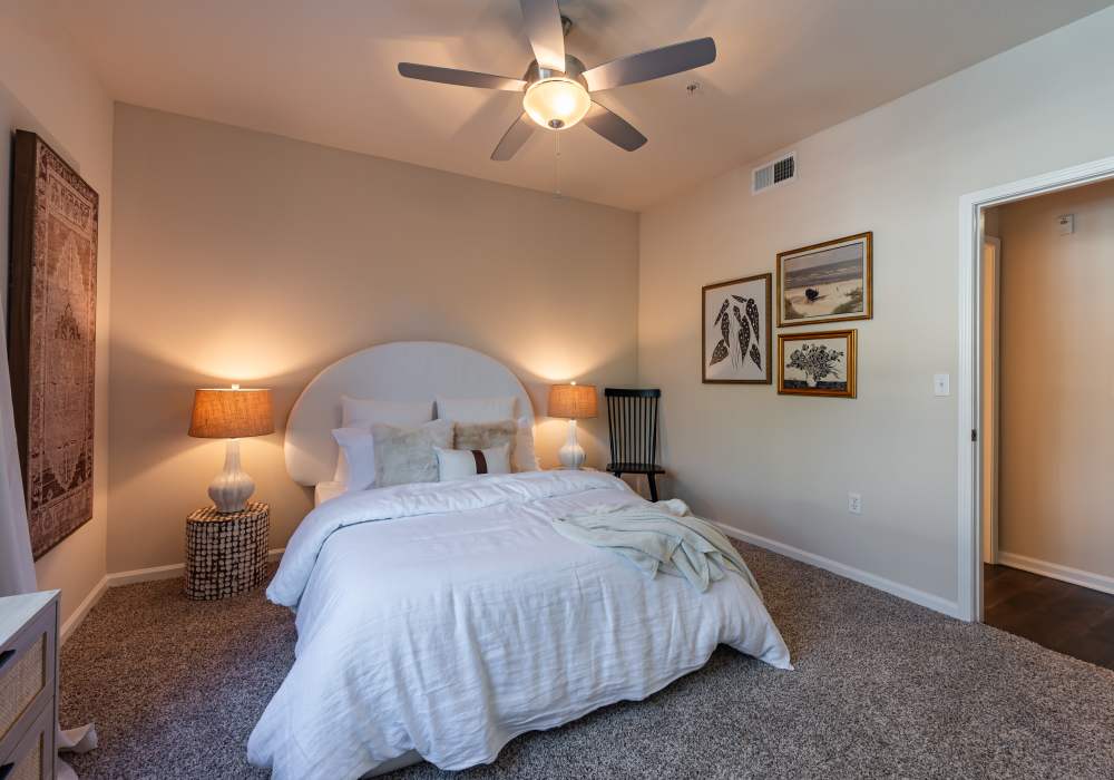 Bright bedroom large bed at Links at Westridge in Valencia, California, 