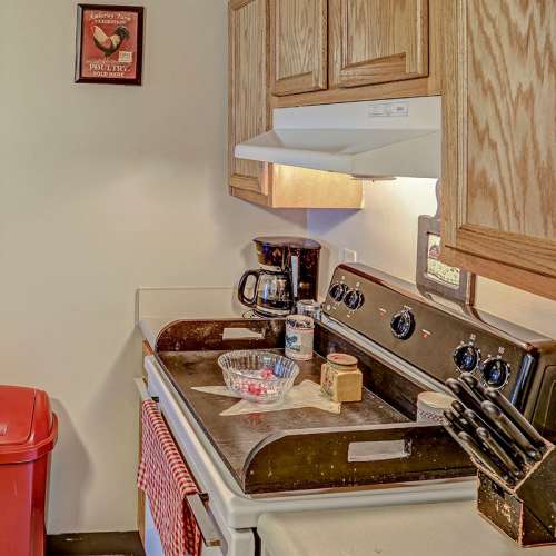 Kitchen with stainless steel appliances at Glennview Apartments in Washington Court House, Ohio