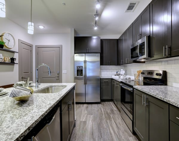 Bright, fully equipped kitchen at The Sawyer at One Bellevue Place in Nashville, Tennessee 