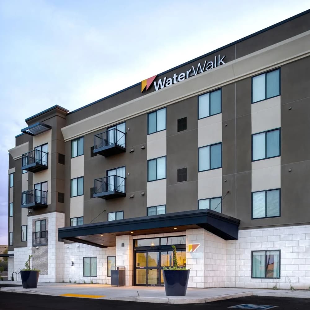 Modern apartment building exterior at WaterWalk Huntsville in Huntsville, Alabama
