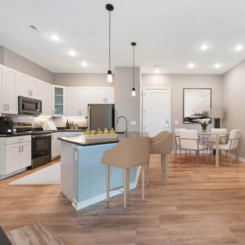 Kitchen and dining area view from living room at Neo Vantage Point in Maryland Heights, Missouri