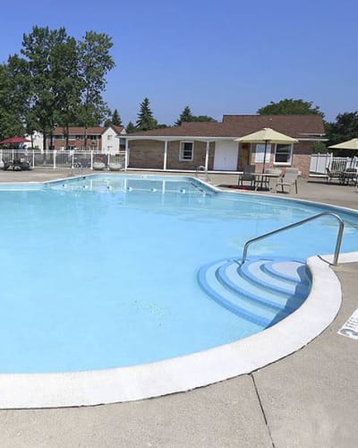 Poolside at Highview Manor Apartments in Fairport, New York
