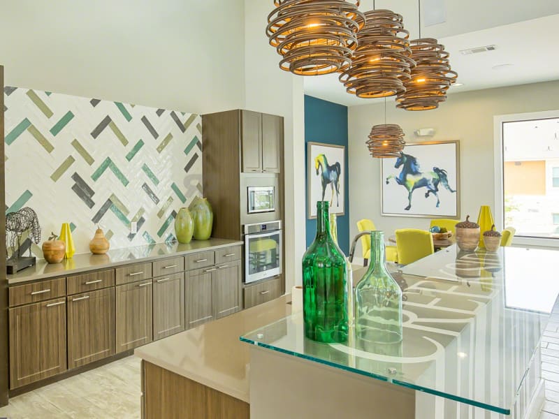 Stunning modern kitchen in the resident clubhouse at Creekside at Kenney's Fort in Round Rock, Texas