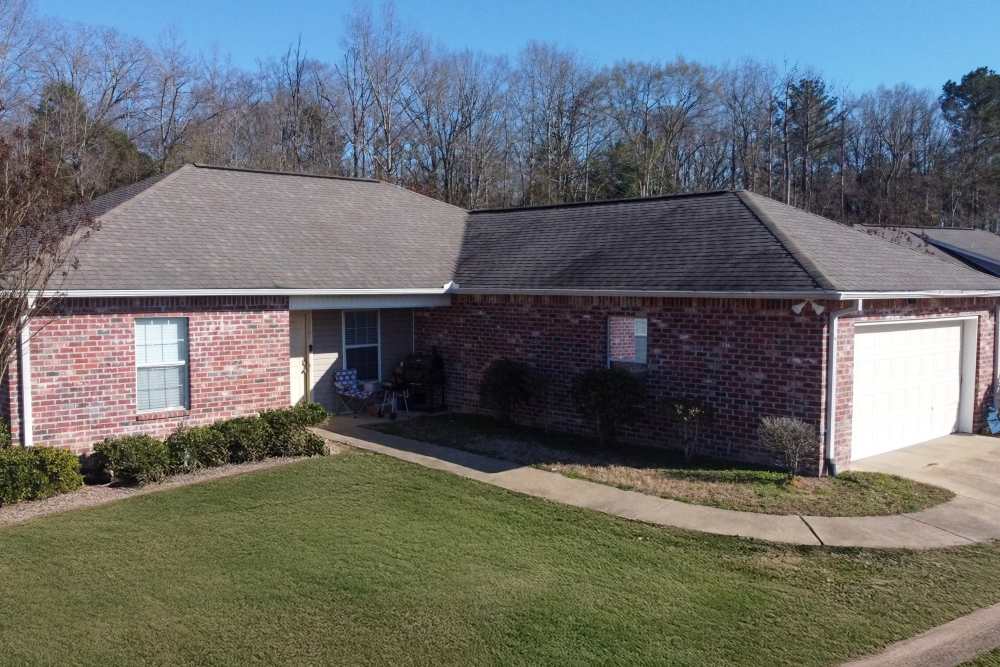 Single-family home with brick exterior at Shaw Estates in Jackson, Mississippi