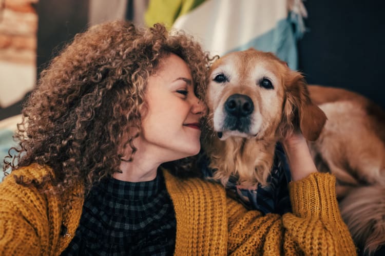 Resident and her dog loving their new home at 300 Riverside in Austell, Georgia