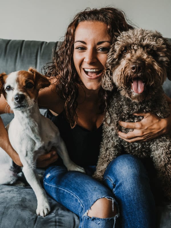 Resident and her puppies at Polaris Apartments in Broomfield, Colorado