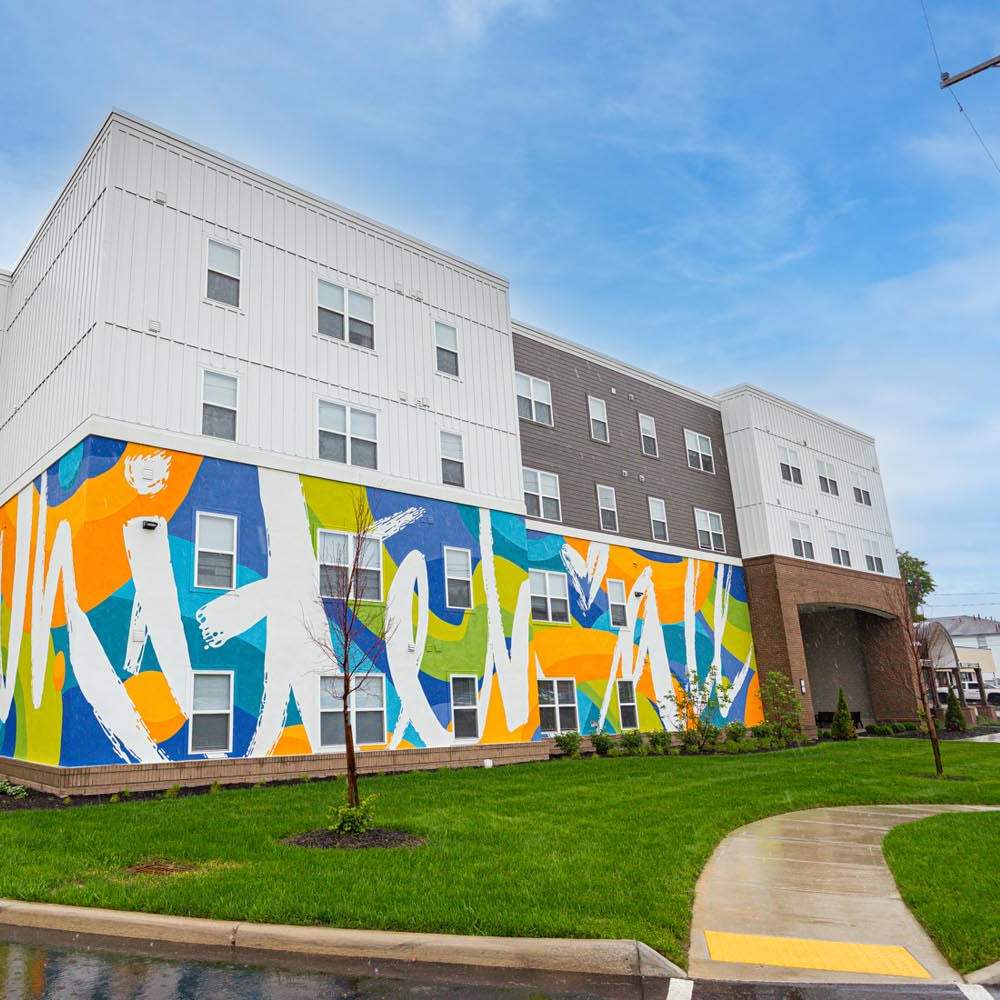 Exterior view of the apartment building at The Enclave on Main in Whitehall, Ohio