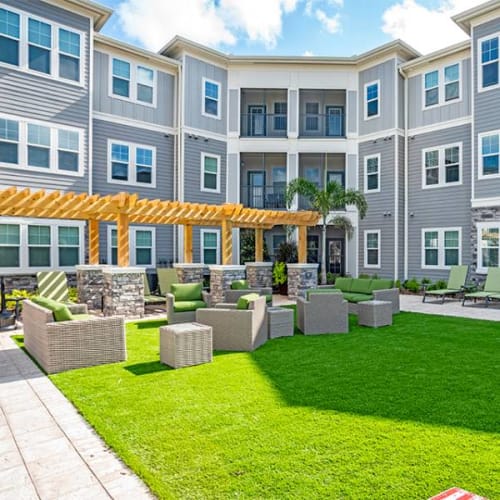 Outdoor lounge area at Lotus at Starkey Ranch in Odessa, Florida