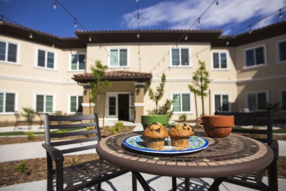 Patio seating with muffins at The Pointe at Summit Hills in Bakersfield, California. 