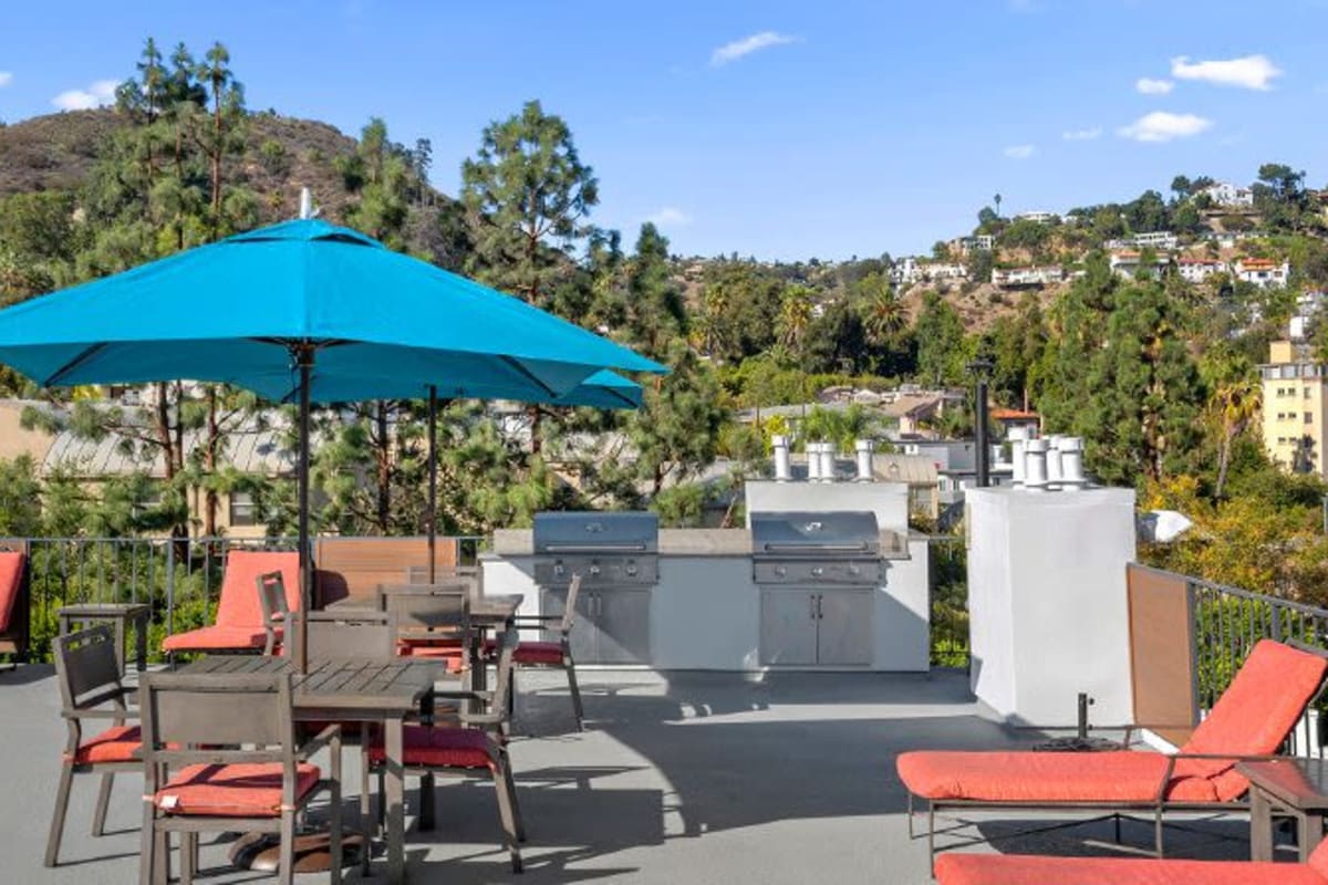 Patio table with umbrella at The Ruby Hollywood, Los Angeles, California