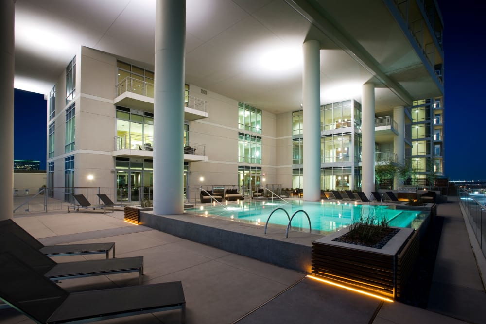 The Heights at Park Lane's gorgeous exterior with a swimming pool in Dallas, Texas