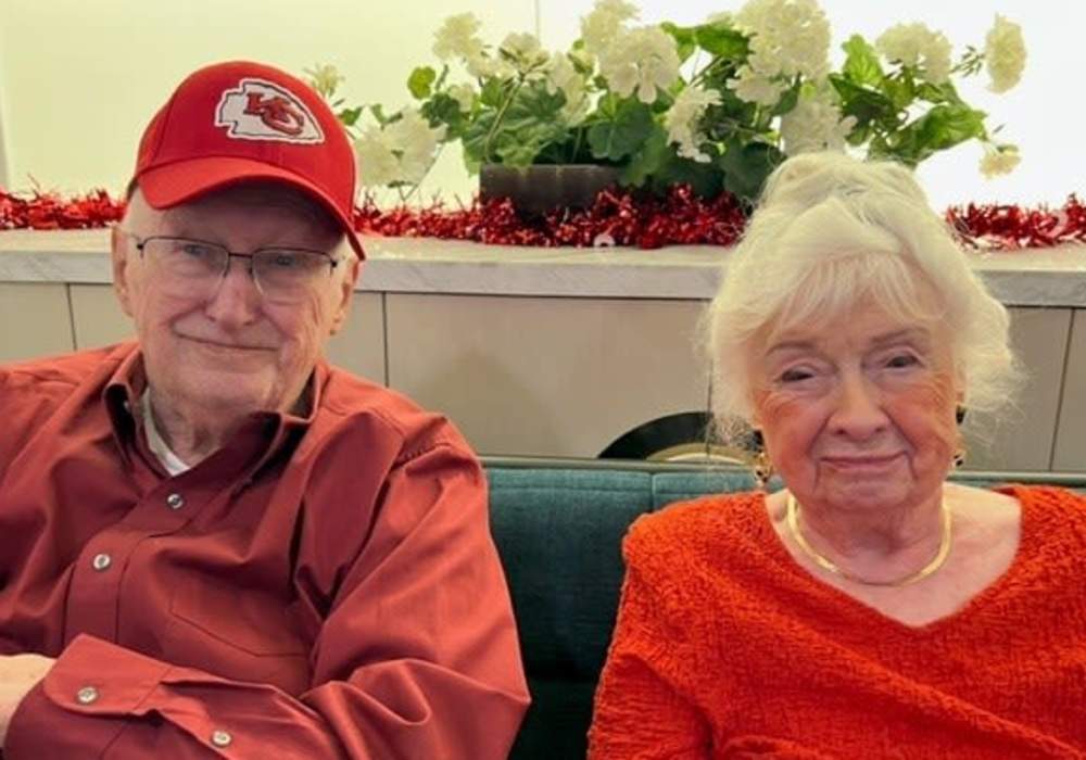 Resident couple dressed in red at Turners Rock in Springfield, Missouri