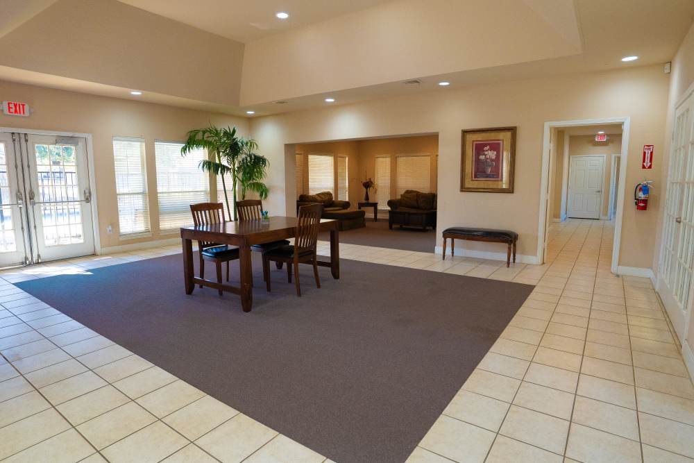 Clubhouse dining space at Millpoint Townhomes in Henderson, Texas